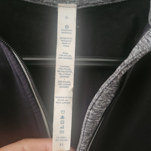 Lululemon 1/4 zip black and grey long sleeve top with thumb holes. Size 6. - Picture 4 of 5